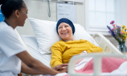 cancer patient laying in hospital bed