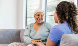 cancer patient sitting with provider